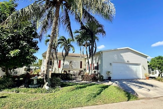 6403 Birch Ln, Atlantis, FL 33462