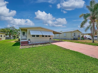 7337 SE Swan Ave, Hobe Sound, FL 33455