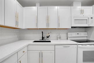 3001 S Course Dr Unit 105, Pompano Beach, FL 33069