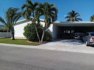 587 Blackbear Rd, Naples, FL 34113