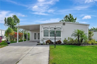 50 Le Mans Dr, Naples, FL 34112