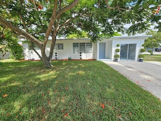 99 Henthorne Dr, Lake Worth, FL 33461