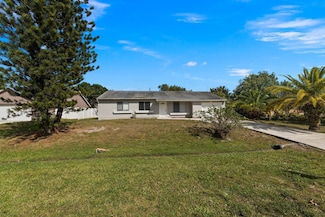 1971 SE Carvalho St, Port Saint Lucie, FL 34983