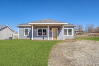 228 W Cardinal St, Ector, TX 75439