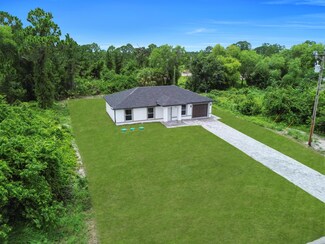 382 Mcarthur Blvd, Lehigh Acres, FL 33974