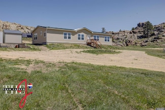 67 Monument Creek Rd, Hanna, WY 82327