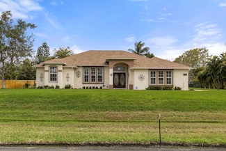 104 SW Lion Ln, Port Saint Lucie, FL 34953