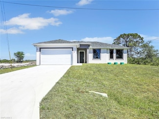 633 Cane St E, Lehigh Acres, FL 33974
