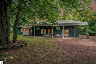 2875 Whispering Maples Dr, Interlochen, MI 49643