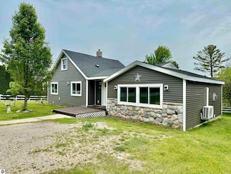 7160 Cherry Ave, Kewadin, MI 49648