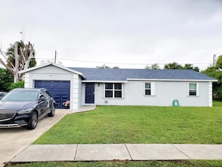 1477 N Mangonia Dr, West Palm Beach, FL 33401