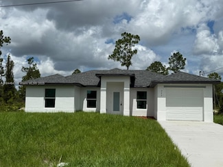 322 Mcarthur Blvd, Lehigh Acres, FL 33974