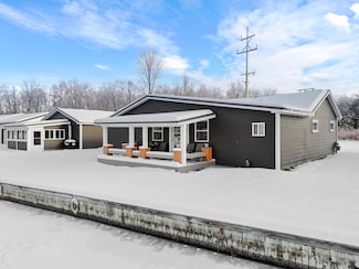 4675 Bradford Dr, Houghton Lake, MI 48629