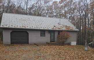 411 Peach Rd, Roscommon, MI 48653