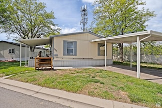 235 E Crusader Dr, Murray, UT 84107