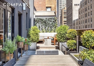 140 W 58th St, New York, NY 10019