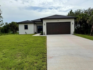 811 Thompson Ave, Lehigh Acres, FL 33972