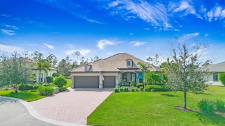 7788 Winding Cypress Dr, Naples, FL 34114