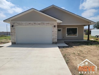 907 Walnut St, Deerfield, KS 67838