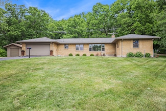 6667 W River Dr NE, Belmont, MI 49306