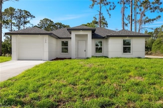 706 Lamar St E, Lehigh Acres, FL 33974