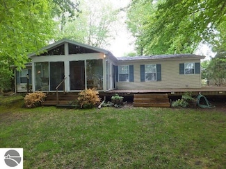 7896 N Shore Ct, Grawn, MI 49637