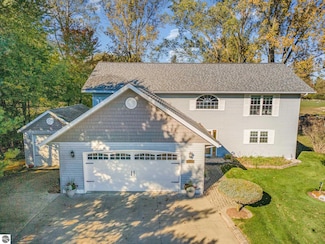 1057 Crown Point Dr, Weidman, MI 48893