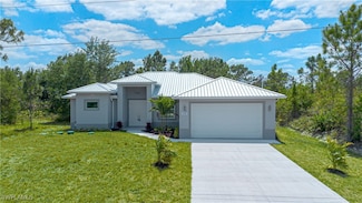 438 Raymer St, Lehigh Acres, FL 33974