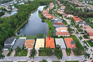5583 Lago Villaggio Way, Naples, FL 34104