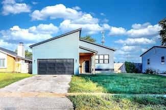 3645 Woodman Dr, Florissant, MO 63031