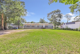 297 County Road 3792, Cleveland, TX 77328