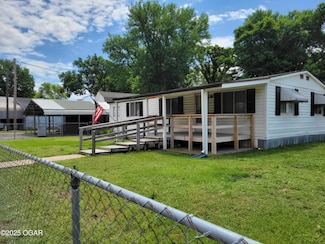 401 E Daugherty St, Carterville, MO 64835