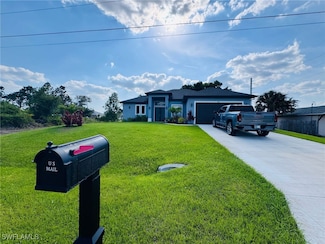 52 Unice Ave S, Lehigh Acres, FL 33976
