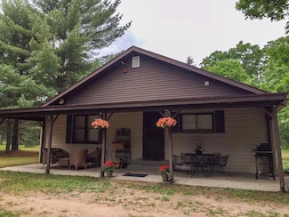 2398 W 10 1 2 Mile Rd, Irons, MI 49644
