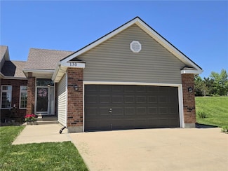 130 N Oxford Dr, Raymore, MO 64083