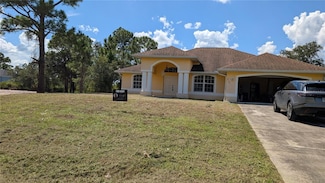 612 Columbus Blvd S, Lehigh Acres, FL 33974