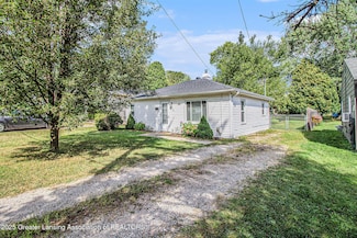 2216 Coolridge Rd, Holt, MI 48842