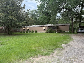 11928 Hairston Dr, Willis, TX 77318