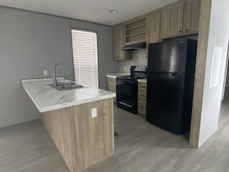 411 S Grover Ave Unit 60, Alma, MI 48801