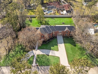 15 Enchanted Woods Dr, Kingwood, TX 77339