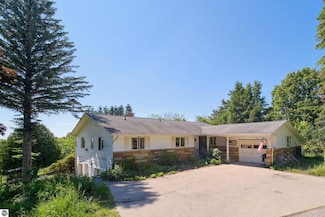 762 Eastman Rd, Beulah, MI 49617