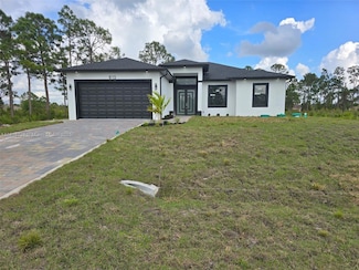 815 Anaconda Ave S, Lehigh Acres, FL 33974