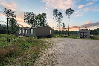 939 N Coleman Rd, Shepherd, MI 48883