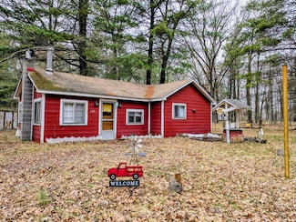 630 Ivy Ln, Marion, MI 49665