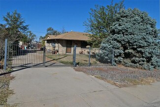 8287 Ivanhoe St, Dupont, CO 80024