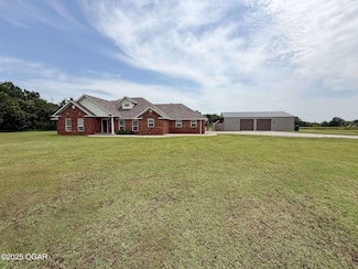 201 S Canary Ln, Commerce, OK 74339