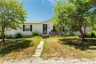 906 S Buckner Tarsney Rd, Buckner, MO 64016