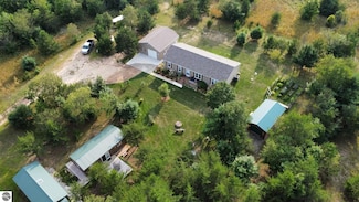 8829 Priest Rd NE, Mancelona, MI 49659