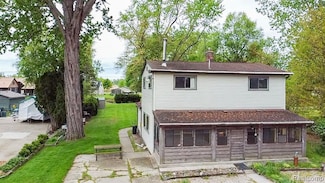 1397 N Channel Dr, Harsens Island, MI 48028