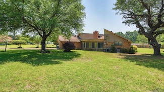 242 W Victoria Woods St, Waskom, TX 75692